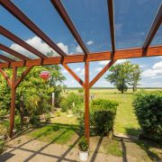 Holz und Glas als Terrassenüberdachung